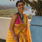 Meenakshi Chaudhary in Pushpanjali Yellow Banarasi Handwoven Silk Saree